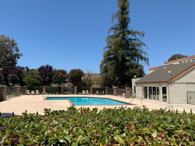 view of pool with a patio area