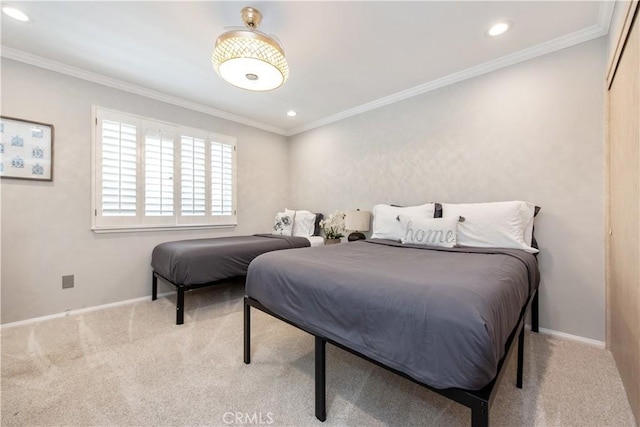 carpeted bedroom featuring crown molding