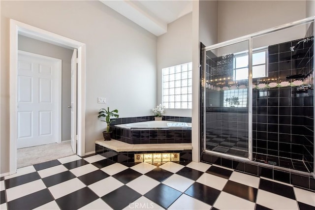 bathroom featuring plus walk in shower