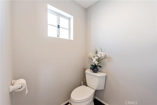 bathroom featuring toilet