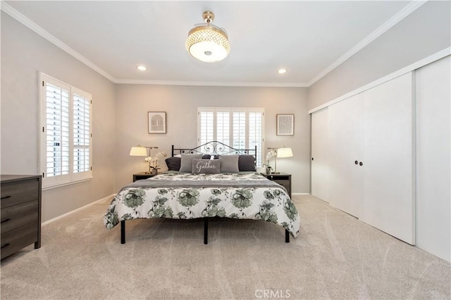 carpeted bedroom with ornamental molding and multiple windows