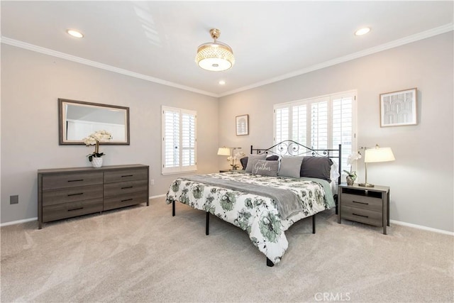 bedroom with ornamental molding and light colored carpet