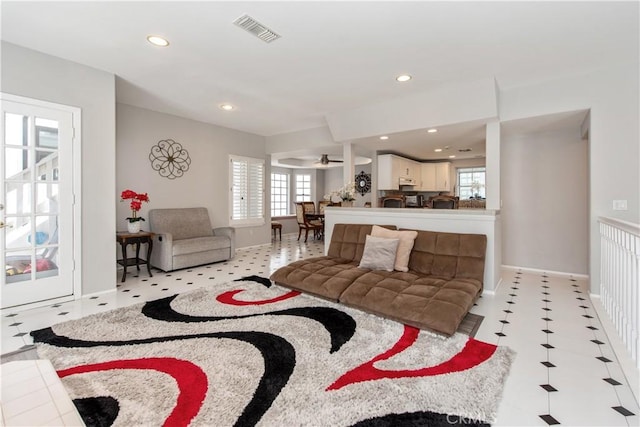 living room with ceiling fan