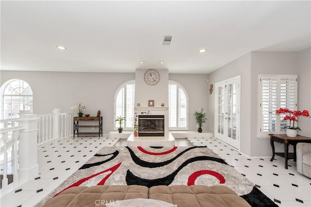 living room featuring a fireplace