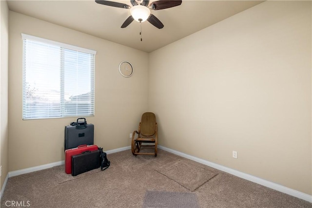 unfurnished room featuring carpet floors and ceiling fan