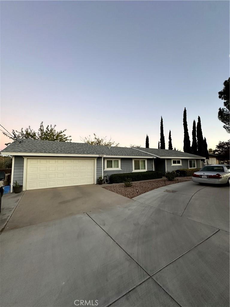 single story home with a garage