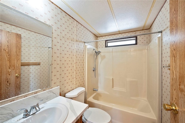 full bathroom with toilet, vanity,  shower combination, and a textured ceiling