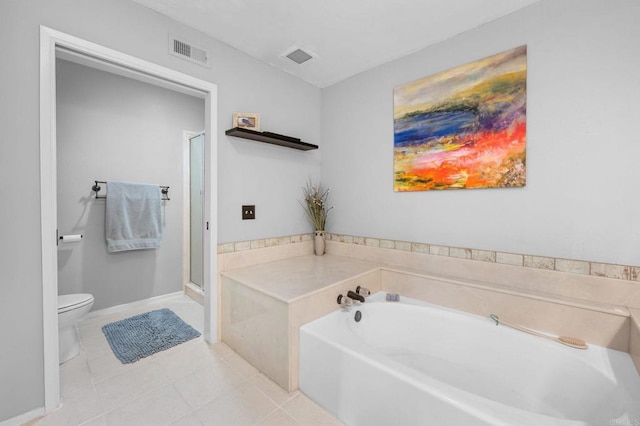 bathroom featuring toilet, tile patterned flooring, and independent shower and bath