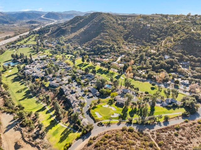 drone / aerial view featuring a mountain view