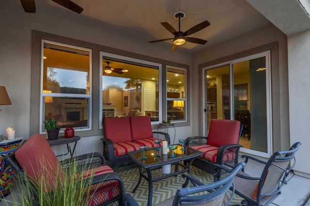 view of patio / terrace featuring ceiling fan and outdoor lounge area