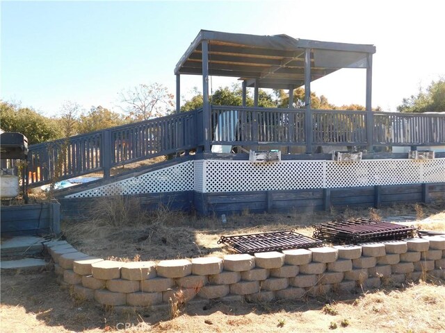 view of swimming pool featuring a deck