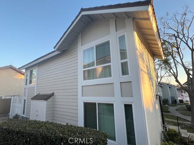 view of property exterior at dusk