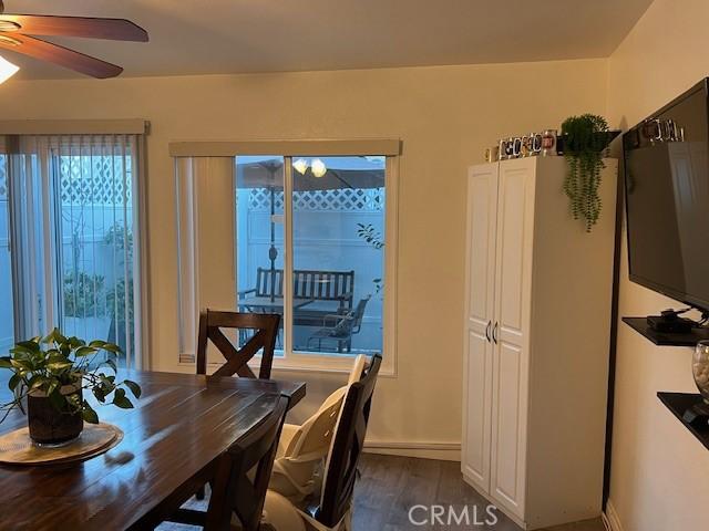 dining area featuring ceiling fan and hardwood / wood-style flooring