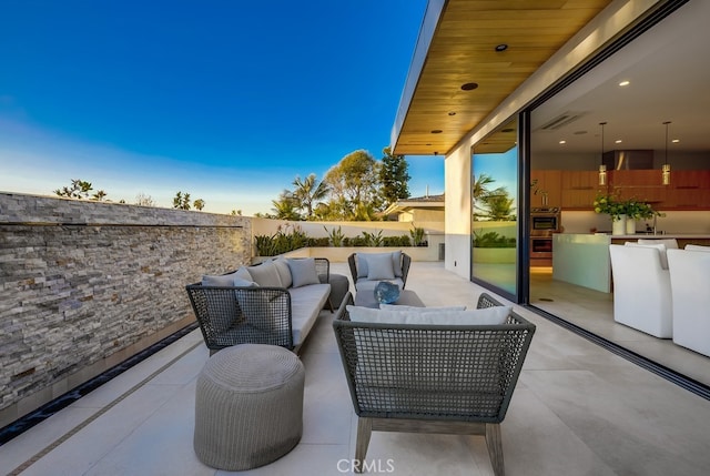 view of patio with an outdoor hangout area