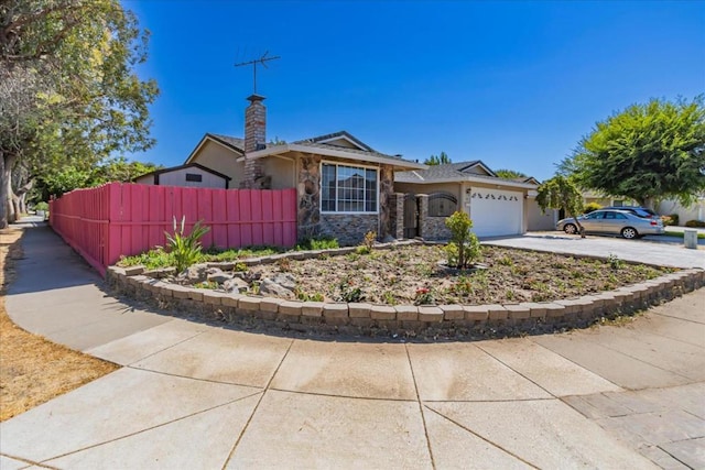 ranch-style house with a garage