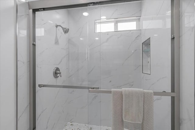 bathroom featuring walk in shower