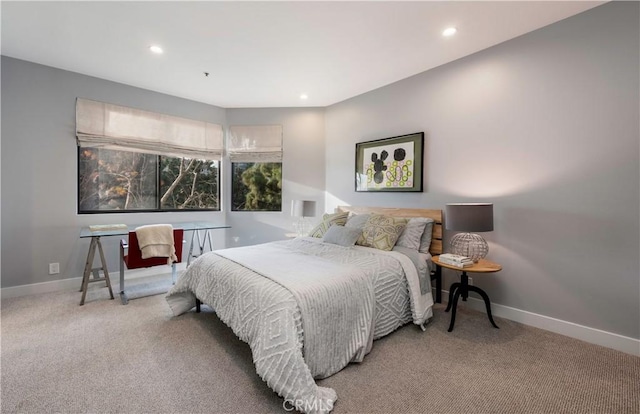 carpeted bedroom with recessed lighting and baseboards