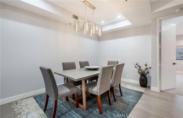 dining space featuring hardwood / wood-style floors