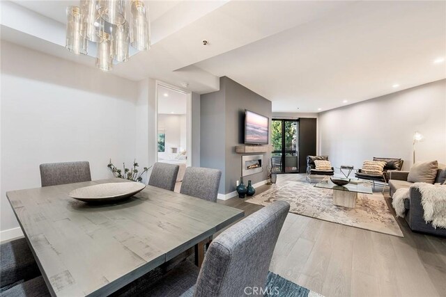 dining area featuring hardwood / wood-style flooring