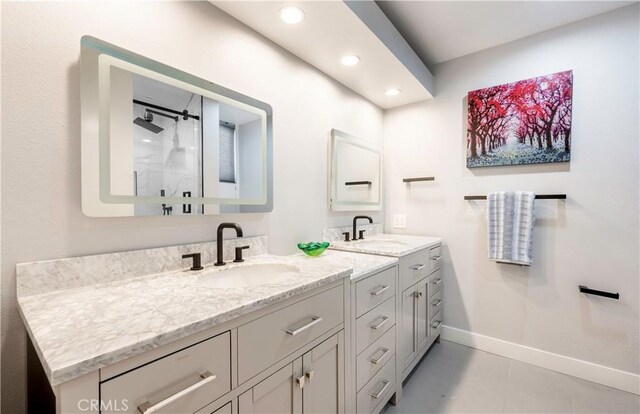 bathroom featuring vanity and tile patterned floors