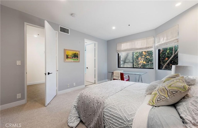 bedroom featuring recessed lighting, visible vents, light carpet, and baseboards