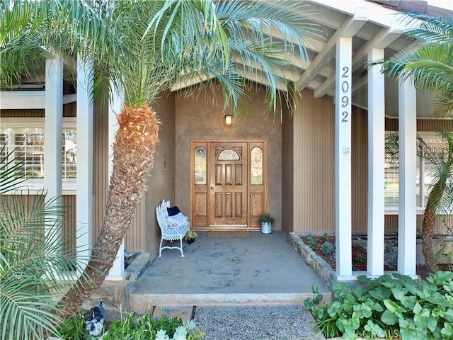 property entrance with a porch