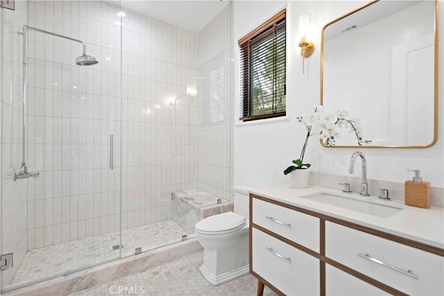 bathroom with vanity, an enclosed shower, tile patterned floors, and toilet