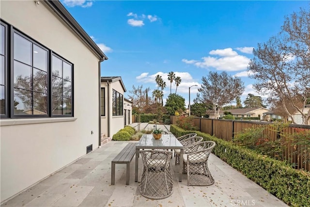 view of patio / terrace with fence private yard and outdoor dining area