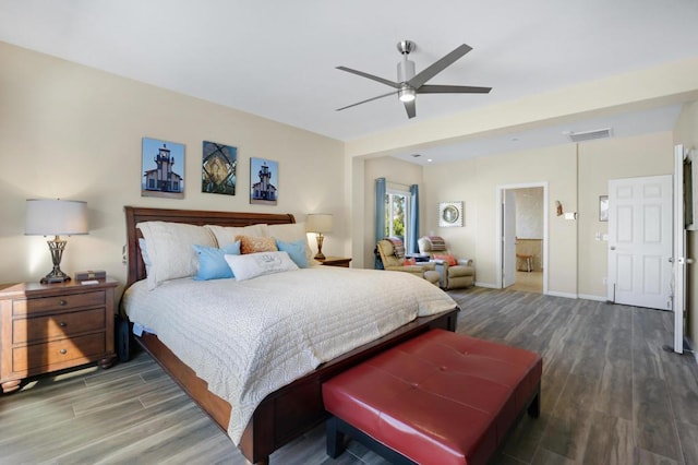 bedroom with ceiling fan, hardwood / wood-style floors, and ensuite bathroom