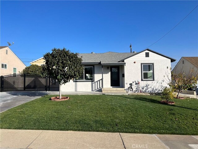 view of front of home with a front yard