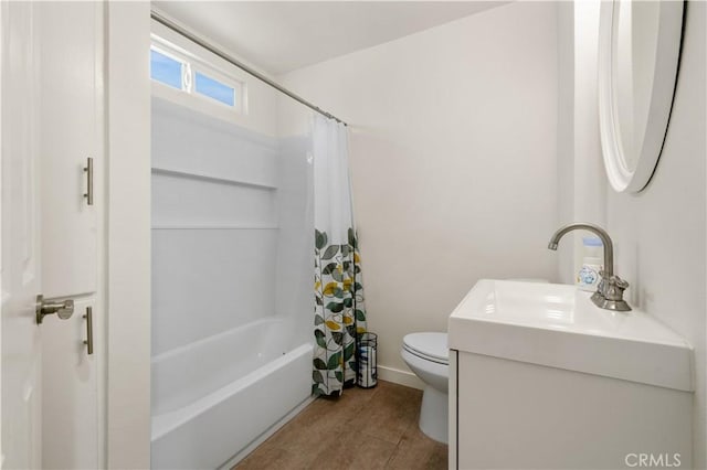 full bathroom featuring toilet, vanity, tile patterned floors, and shower / tub combo with curtain