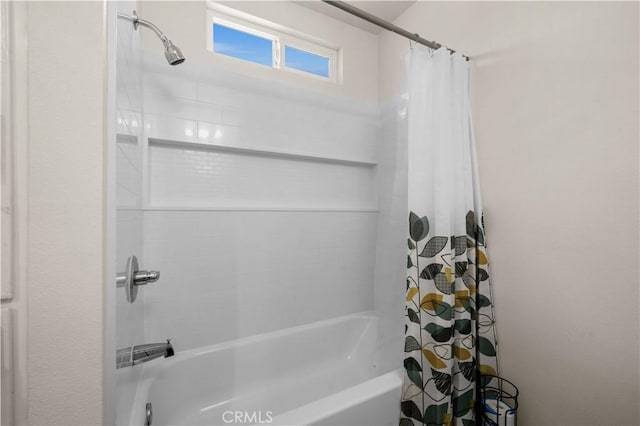 bathroom featuring shower / tub combo