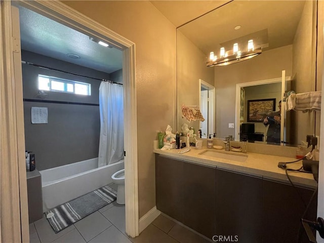 full bathroom featuring shower / bath combo, vanity, tile patterned flooring, a chandelier, and toilet