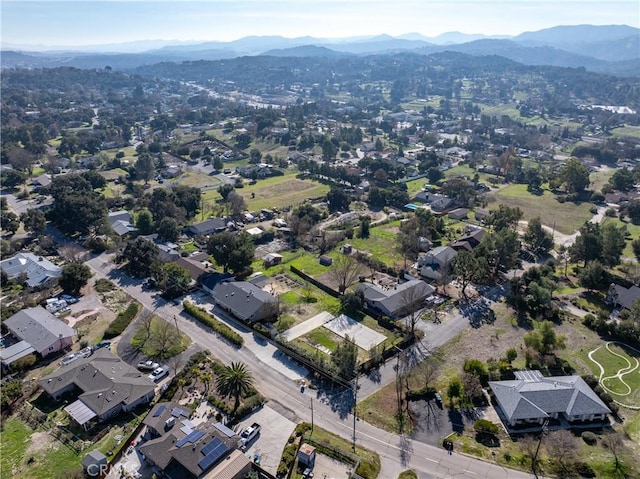 drone / aerial view featuring a mountain view