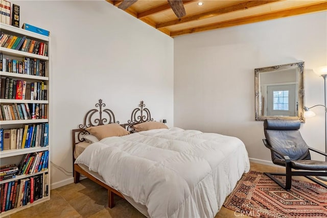 bedroom with beamed ceiling