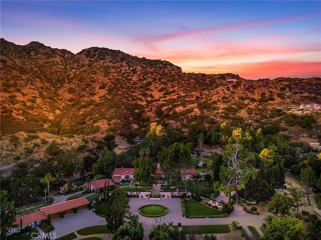 aerial view at dusk with a mountain view