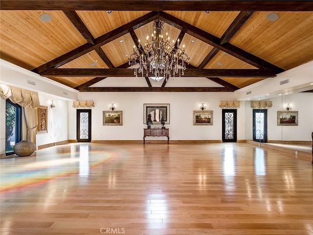 interior space with high vaulted ceiling, light wood-type flooring, an inviting chandelier, and wooden ceiling