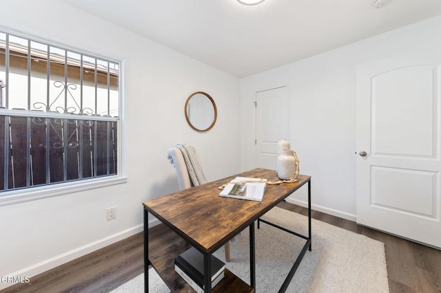 office space featuring dark wood-type flooring