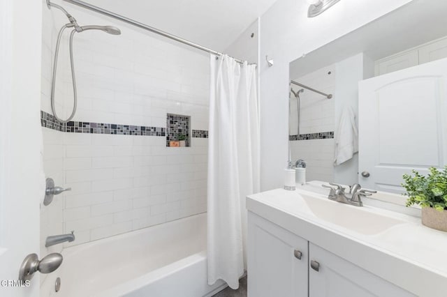 bathroom featuring vanity and shower / tub combo