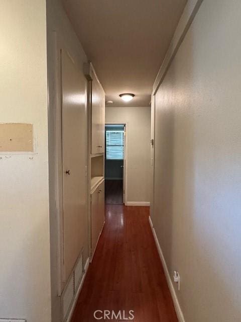 hall featuring dark hardwood / wood-style floors