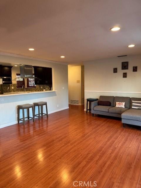 living room featuring dark hardwood / wood-style floors