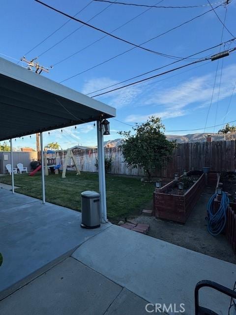 view of patio featuring a playground