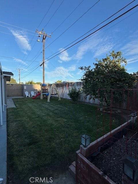 view of yard featuring a playground