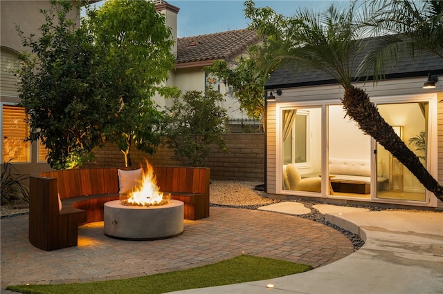 view of patio / terrace featuring a fire pit