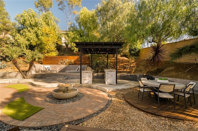 view of patio featuring exterior kitchen