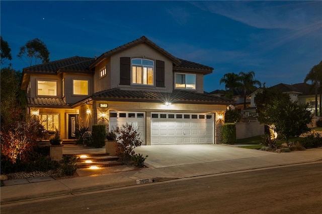 view of front of home with a garage