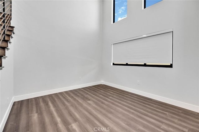 empty room featuring hardwood / wood-style flooring