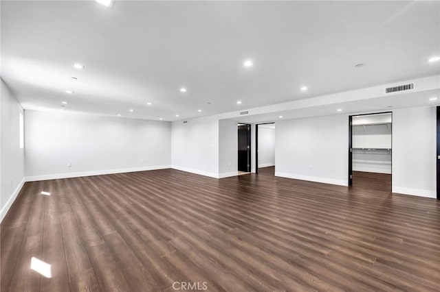 empty room featuring dark hardwood / wood-style floors