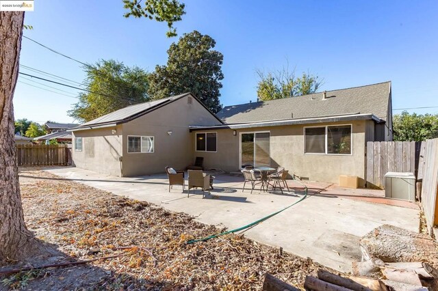 back of house featuring a patio