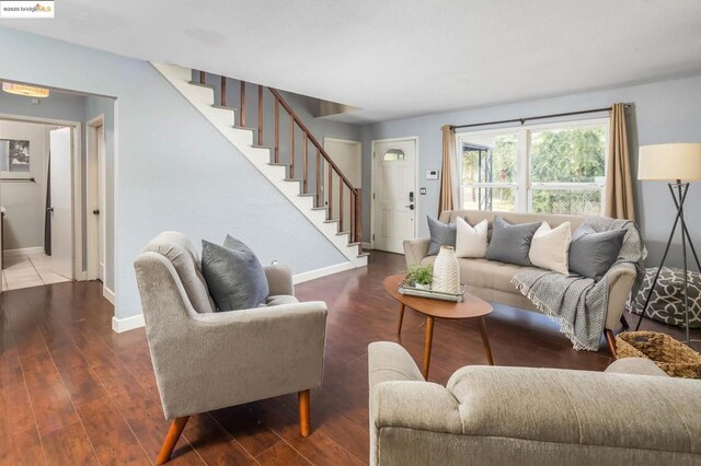 living room with dark hardwood / wood-style floors